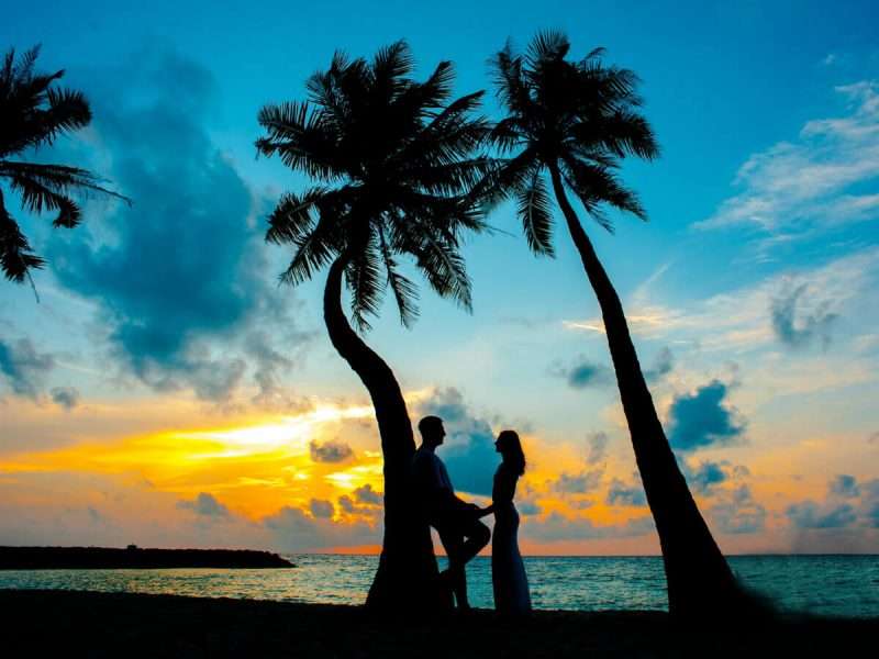 "Alt text: Honeymoon couples in Goa - Embracing romance and creating cherished memories, couples bask in the beauty of Goa's beaches, enjoying a dreamy getaway in a tropical paradise."