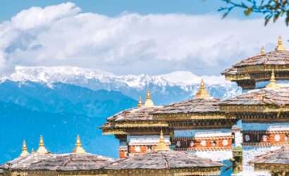 "View of Taktsang Temple with mountains in the background"