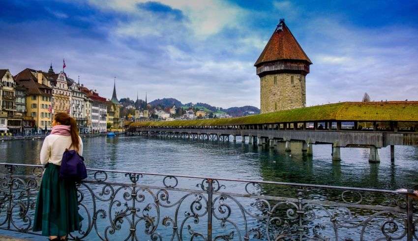 "View of the famous suspension bridge in Switzerland with the beautiful mountain landscape in the background"